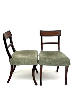 Lot 3133 - Pair Regency mahogany sabre leg dining chairs.