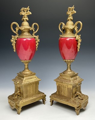 Lot 2932 - A 19th century gilt metal and porcelain three...