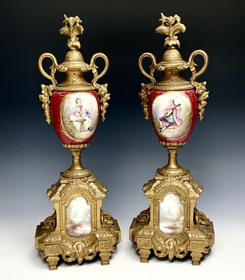 Lot 2932 - A 19th century gilt metal and porcelain three...