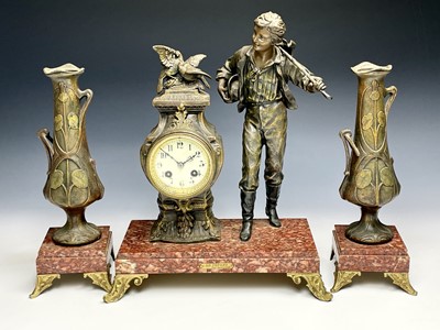 Lot 2939 - A French spelter three-piece clock garniture,...