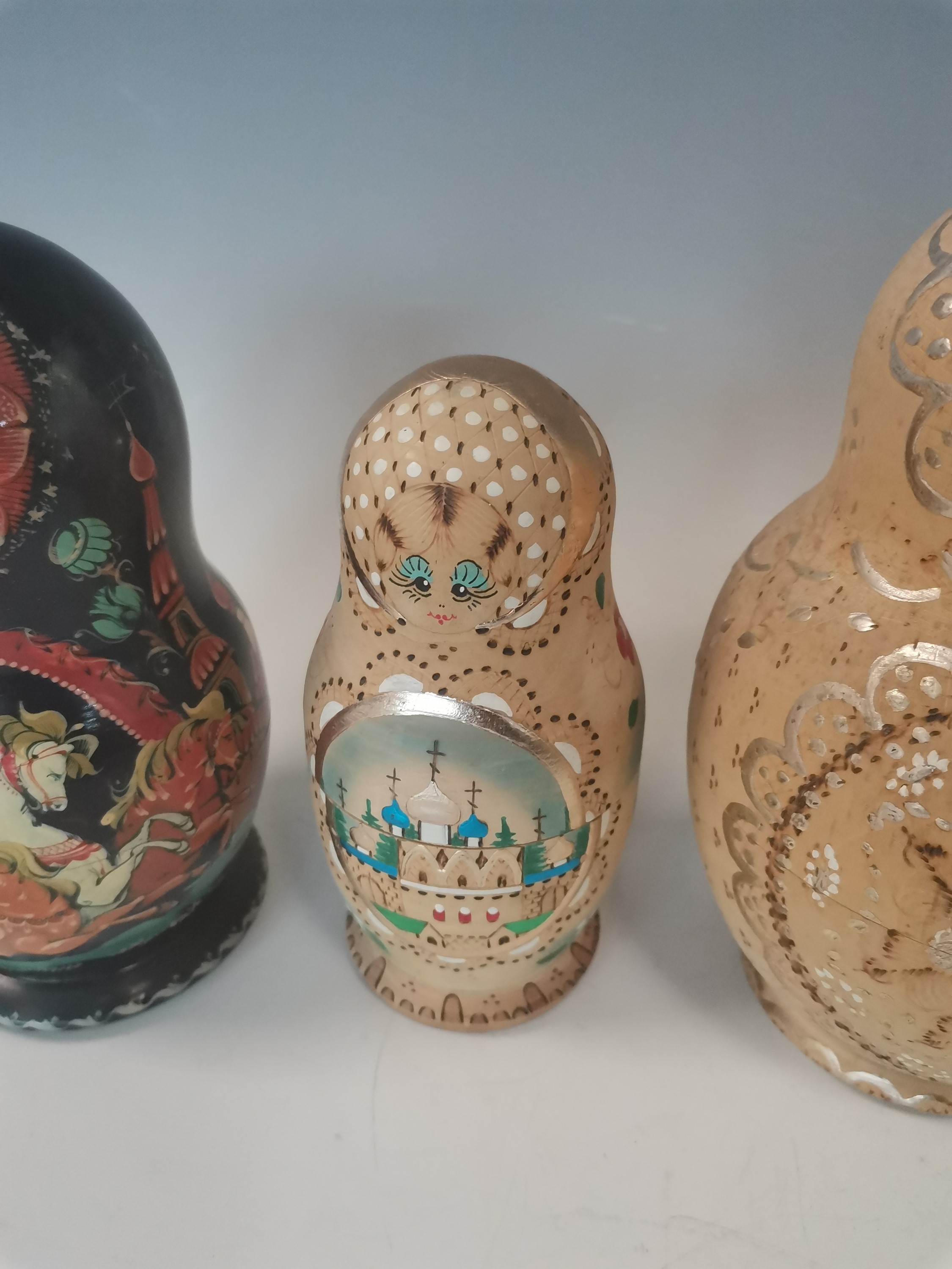 Lot 176 - Five sets of hand painted Russian nesting