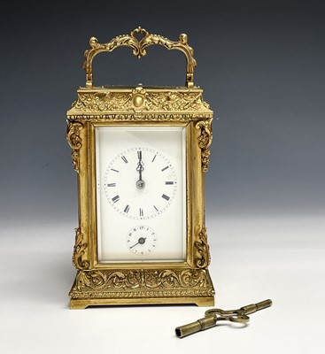 Lot 2944 - A late 19th century gilt metal carriage clock,...