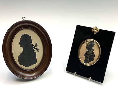 Lot 1484 - A 19th century oval silhouette portrait of a...