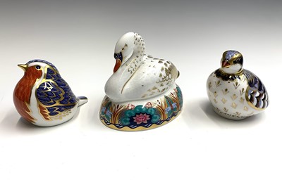 Lot 1153 - Three Royal Crown Derby bird paperweights,...