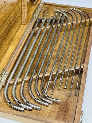 Lot 450 - An early 20th century set of twelve catheters...