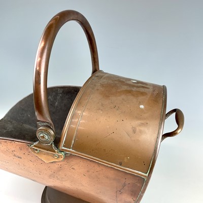 Lot 214 - A Georgian copper coal scuttle, height 30.5cm,...