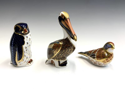 Lot 1154 - Three Royal Crown Derby bird paperweights,...