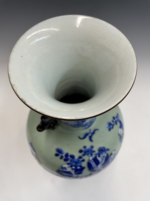 Lot 75 - A Chinese celadon porcelain baluster vase,...