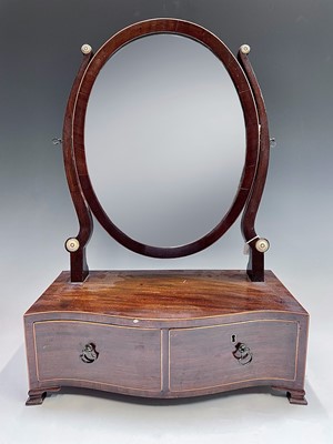 Lot 3066 - A George III mahogany oval dressing table...