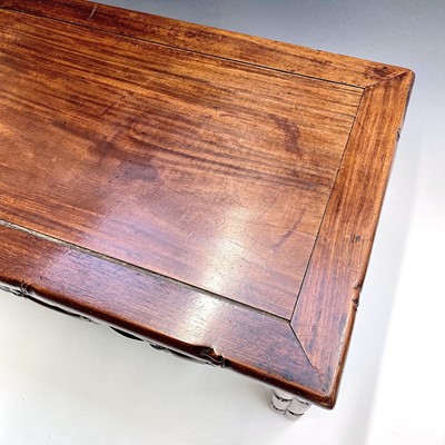 Lot 5 - A Chinese hardwood Kang table, with a pierced...