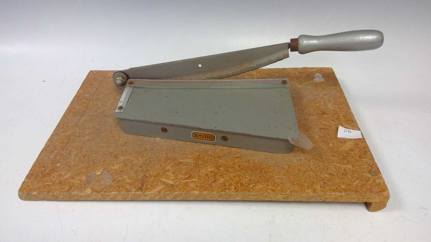 Lot 248 A small paper guillotine by Amato.