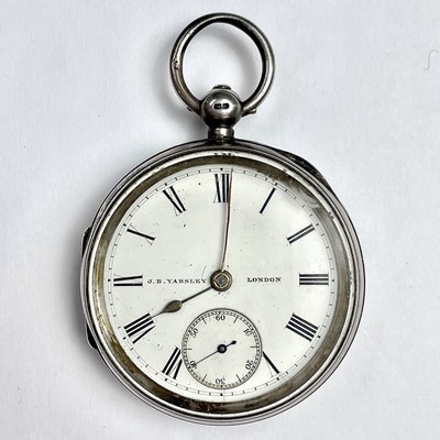 Lot 988 - A silver key wind open face pocket watch, the...