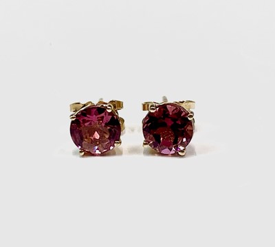 Lot 815 - An attractive pair of gold set pink tourmaline...