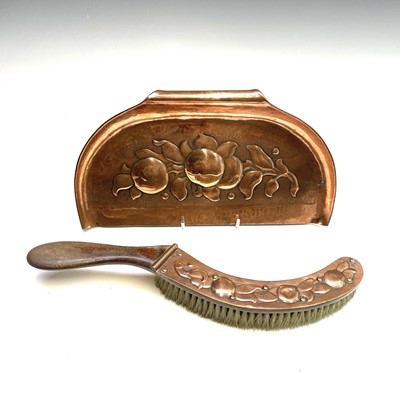 Lot 227 - A Newlyn Copper crumb tray and brush, each...