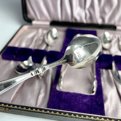 Lot 20 - A cased set of six teaspoons with a pair of...