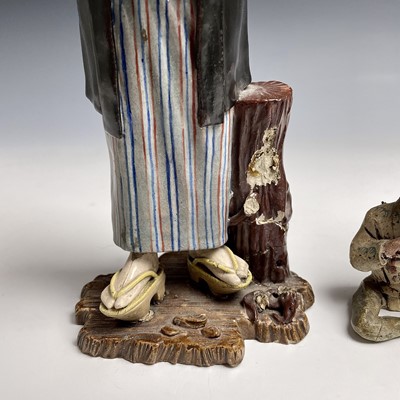Lot 21 - Two Chinese Shiwan pottery figures, early 20th...