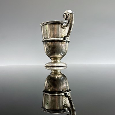 Lot 13 - An Edwardian silver small pedestal trophy cup...