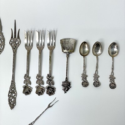 Lot 14 - A collection of white metal cutlery with cast...
