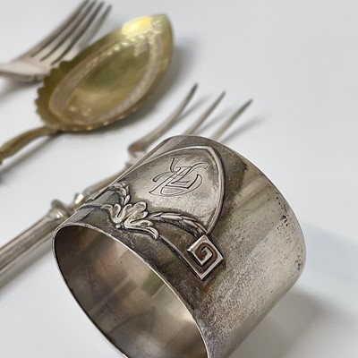 Lot 15 - A continental white metal napkin ring stamped...