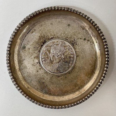 Lot 17 - A pair of silver pin trays, each set with an...