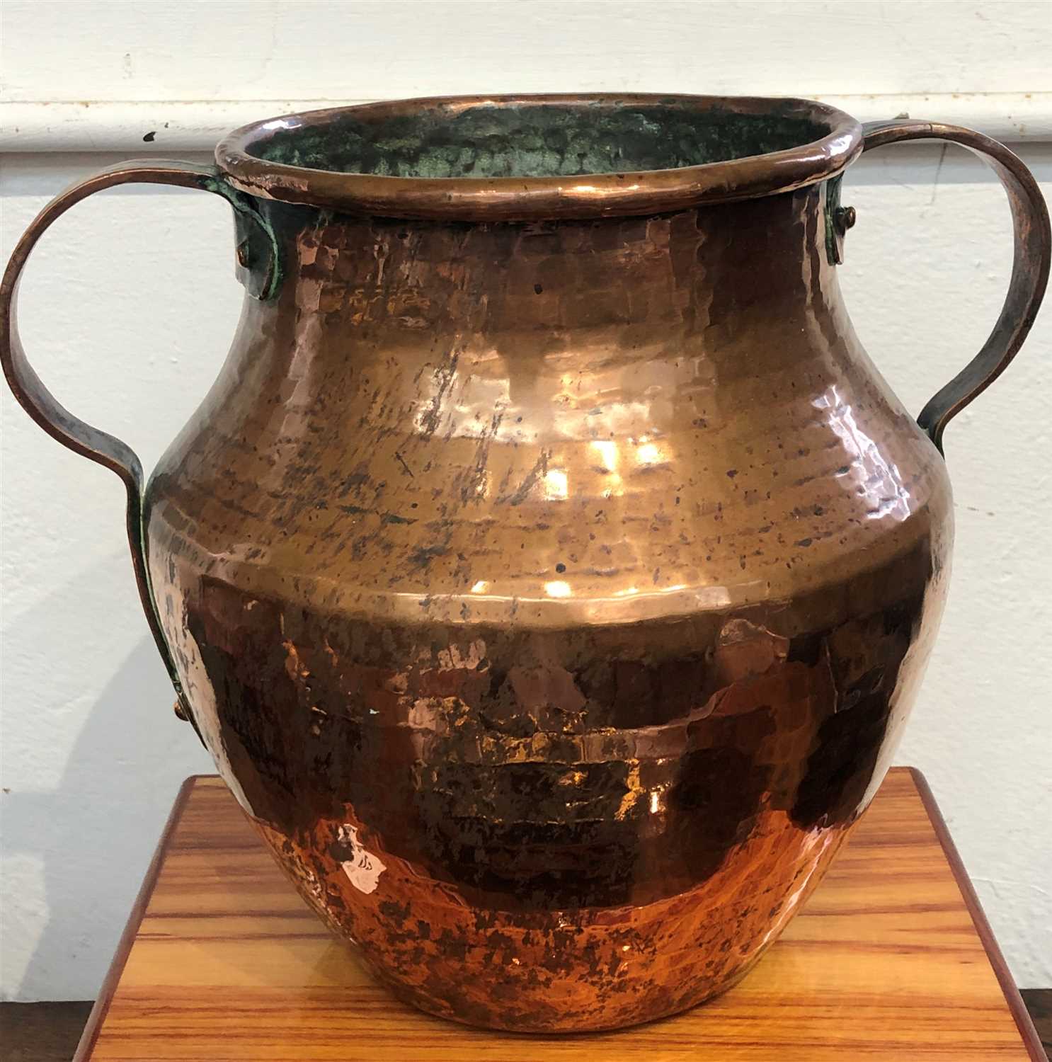 Lot 48 - A Victorian copper twin handled vase.