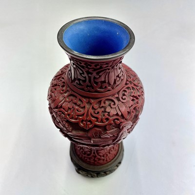Lot 95 - A Chinese cinnabar lacquer vase on stand, with...