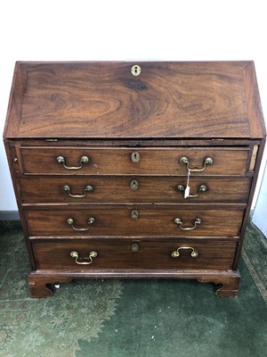 Lot 3046 - A George III mahogany bureau, with fall front...