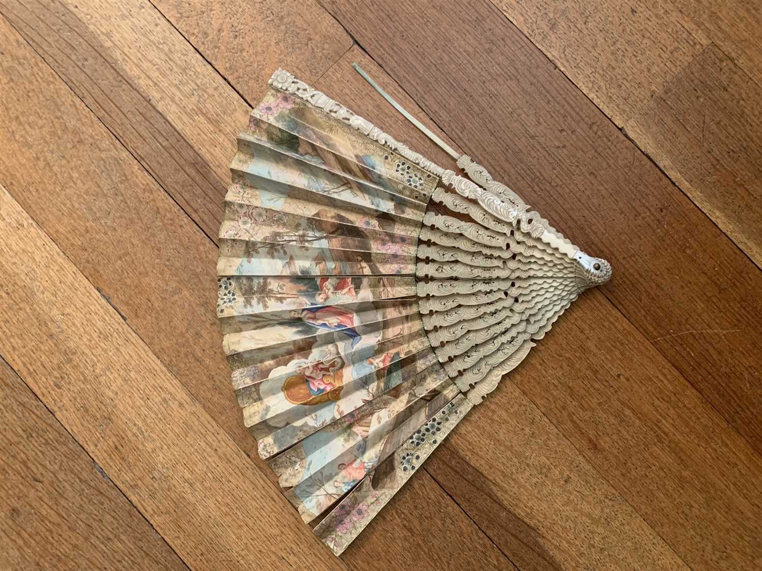Lot 26 - An 18th century fan with hand painted...