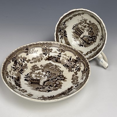 Lot 868 - Four Swansea pottery transfer printed cups and...