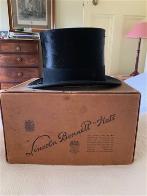 Lot 22 - A silk top hat bearing label Harman & Son...