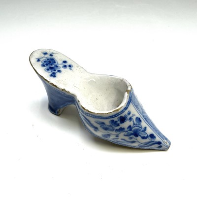 Lot 176 - A Delft blue and white pottery posy holder in...