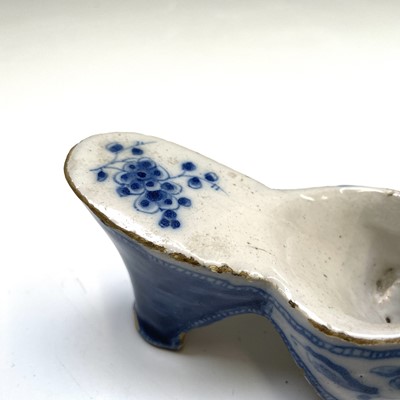 Lot 176 - A Delft blue and white pottery posy holder in...