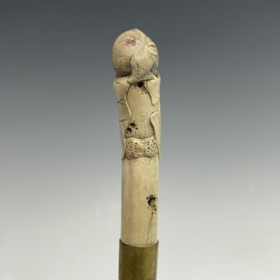Lot 101 - A Japanese bone parasol handle, circa 1900,...