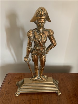 Lot 7 - A 19th century brass doorstop in the form of a...