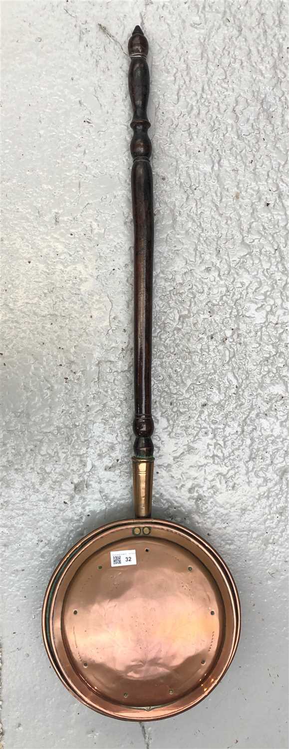 Lot 32 - A Victorian copper warming pan.