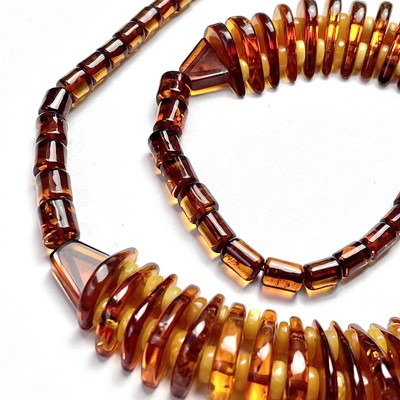 Lot 777 - An Art Deco amber and butterscotch necklace...