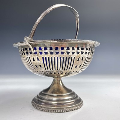 Lot 34 - A George V silver sugar basket with chased...