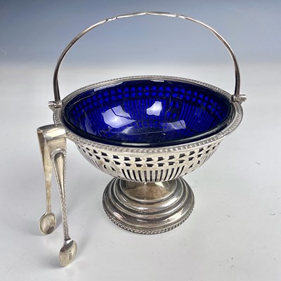 Lot 34 - A George V silver sugar basket with chased...