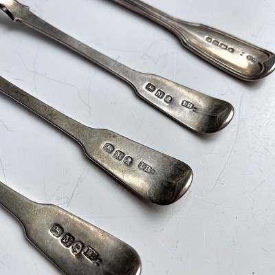 Lot 32 - A set of five George III silver fiddle and...