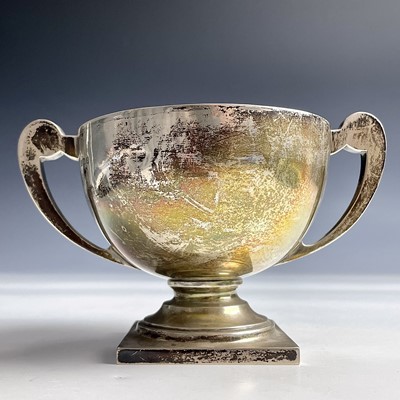 Lot 33 - A George V silver twin handle pedestal trophy...