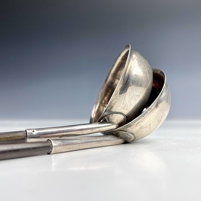 Lot 39 - A pair of Georgian silver small toddy ladles...