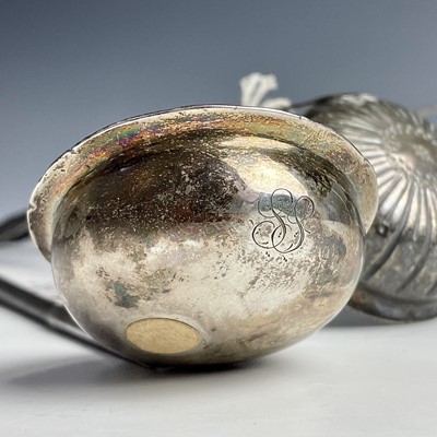 Lot 40 - Three Georgian silver toddy ladles, the bowls...