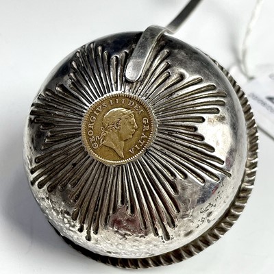 Lot 41 - A George III silver punch ladle with star...
