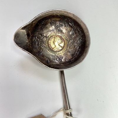 Lot 42 - An 18th century silver punch ladle, the...