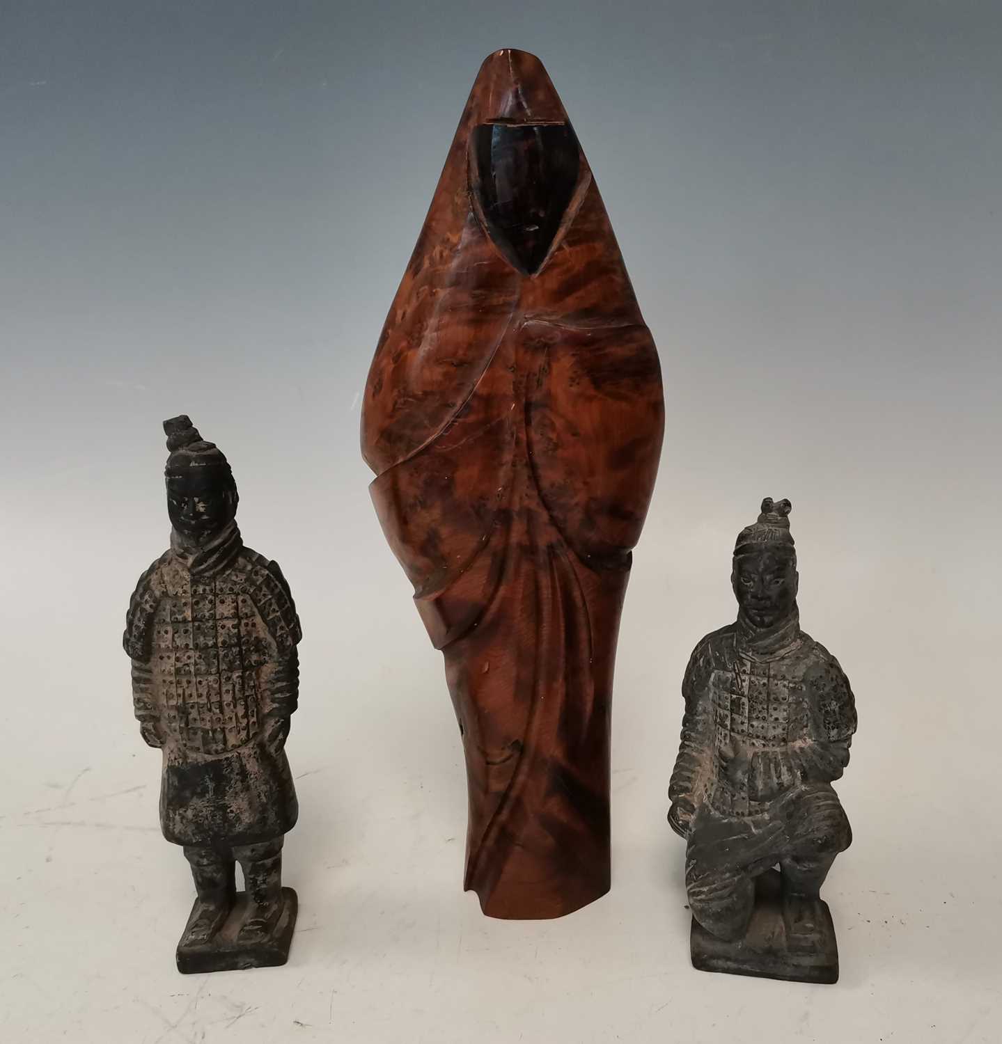 Lot 18 A wooden sculpture of an Arabic figure, and