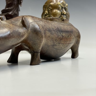 Lot 120 - An Indian carved wood model of a rhino, early...