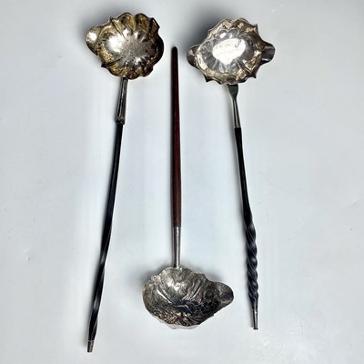 Lot 47 - Three Georgian silver punch ladles, hallmarked...