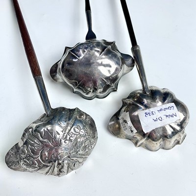 Lot 47 - Three Georgian silver punch ladles, hallmarked...