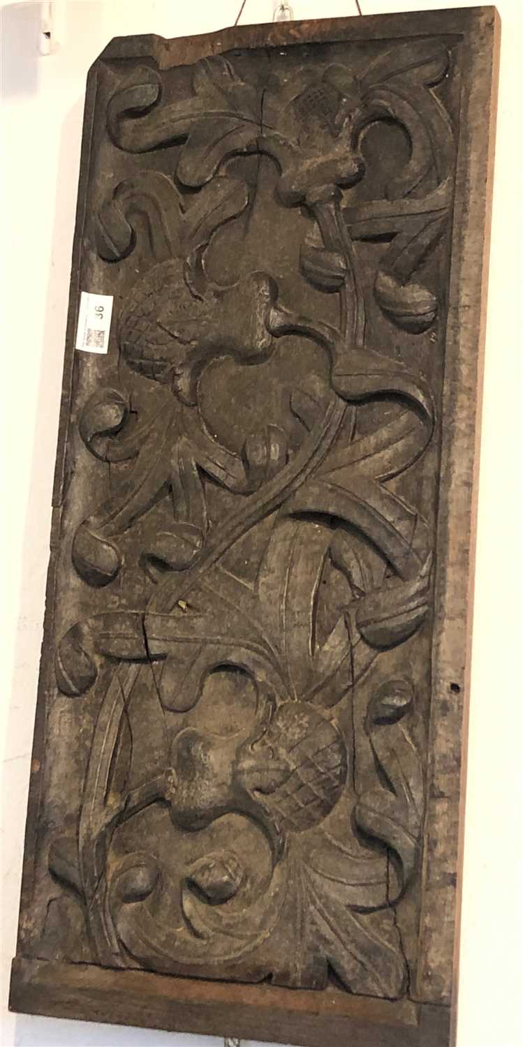 Lot 36 - A late19th/early 20th century carved oak panel.