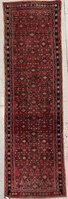 Lot 1207 - A Hamadan runner, circa 1930's, with madder...